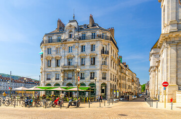 Street restaurant old building in Besancon old town centre ville, Besançon city historic centre Battant district with medieval buildings in sunny summer day, Bourgogne-Franche-Comte region, France
