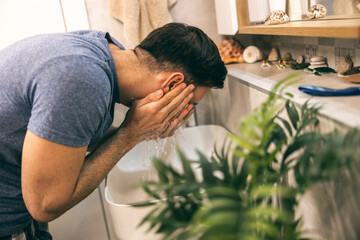 Man Washing Face