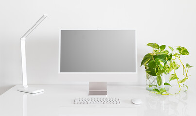 Mockup of Desktop Computer with Blank Screen on Desk