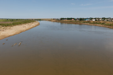 Ural River flowing through Inderbor settlement in Atyrau Region Kazakhstan