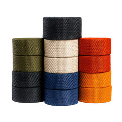 Array of colorful fabric hair ties stacked in neat piles, showcasing different textures and vibrant colors for hair accessories and styling options on transparent background