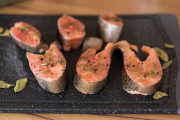 Salmon steaks with herbs and black pepper