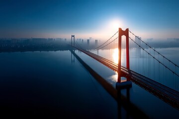 Obraz premium Aerial View of Modern Bridge Over Water at Sunrise with Cityscape