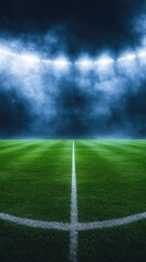A green playing field with white lines and bright lights fills the dark stadium with smokey haze