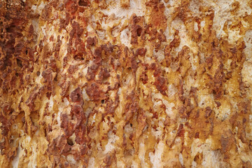 Texture of Rock Surface Called Pha Daeng, a Red-hued Cliff of Iron Accumulation for Millions Years in Prachuap Khiri Khan Province, Thailand