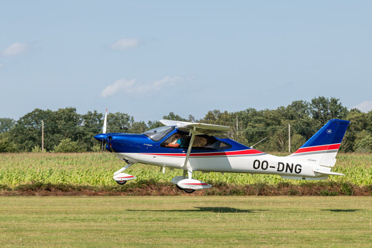 24 august 2024. A light airplane with propeller, type Tecnam P2010 P TwentyTen during take off at Kiewit regional airport. Open house at aero kiewit. Propeller airplane with number 00-DNG