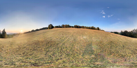 Full Spherical panorama of mountain field sunset