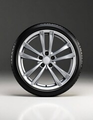 Obraz premium Modern silver alloy wheel on grey background