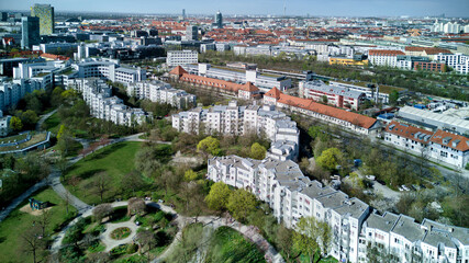 View of Munich from above, from Westpark. A sunny day after a rain, a bright horizon. Aerial shot, drone.