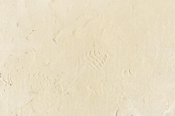 Footprint on sand. Sand texture background.