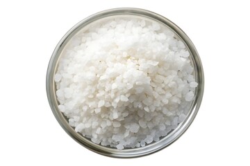 High-angle close-up of coarse sea salt in a small metal bowl.