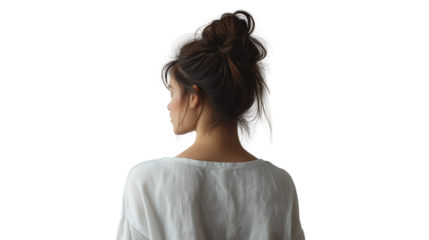Artist girl in messy bun, standing still and thoughtful, back pose, white studio background 