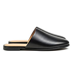 Realistic photo of flat ladies slippers black leather on a white background.