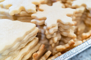 Baking Snowflake-Shaped Sugar Cookies for Homemade Christmas Gifts