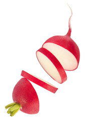 Fresh raw Red Radish with green leaves falling in the air isolated on white backgriund. Food...