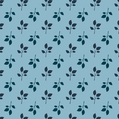 Botanical leaves in silhouette style. Dark leaves on blue background.