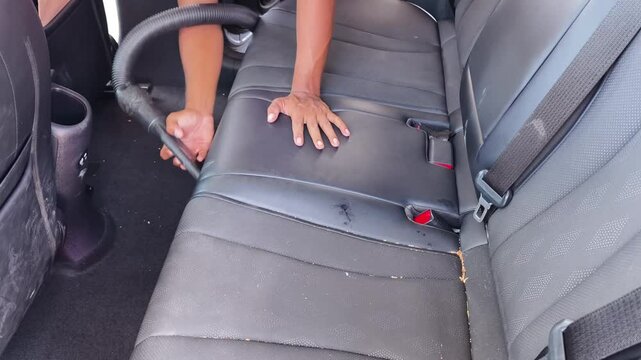 Professional car interior vacuuming service that guarantees spotless cleaning results