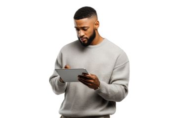 Man using a digital tablet in casual sweater PNG with a transparent background

