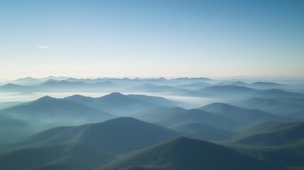 Obraz premium Misty Mountain Range at Sunrise