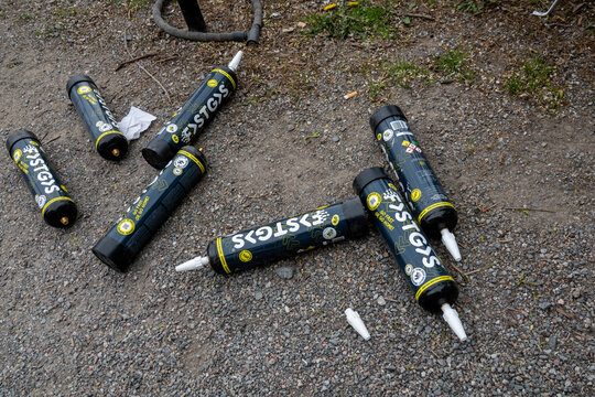 Stockholm, Sweden  Discarded and empty nitrous oxide cartridges on the street.