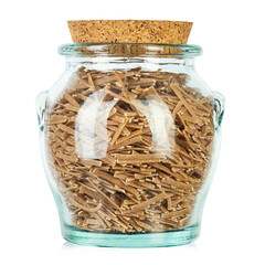 Glass jar filled raw pasta isolated on white background. File contains clipping path.