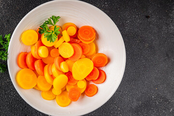 Carrot vegetable rings boiled vegetable dish fresh food background on the table rustic food top view copy space
