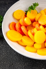 Carrot vegetable rings boiled vegetable dish fresh food background on the table rustic food top view copy space