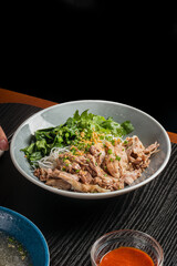 asian noodle with duck and vegetables