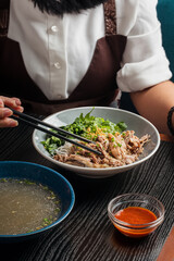 asian noodle with duck and vegetables