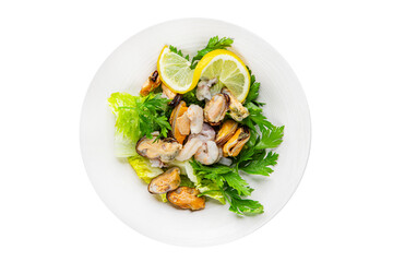Salad seafood shrimp, mussels, squid, rapawn, prawn, green mixed leaf dish fresh food background on the table rustic food top view copy space 