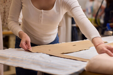 Tailoring Craftsmanship A Fashion Designer at Work Creating Beautiful Patterns with Precision