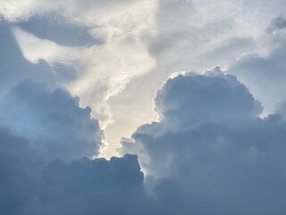 A stunning cloud in the brightly blue sky.