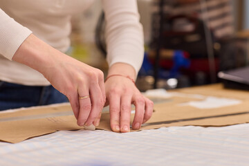 Tailoring Craftsmanship A Fashion Designer at Work Creating Beautiful Patterns with Precision