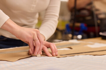 Tailoring Craftsmanship A Fashion Designer at Work Creating Beautiful Patterns with Precision
