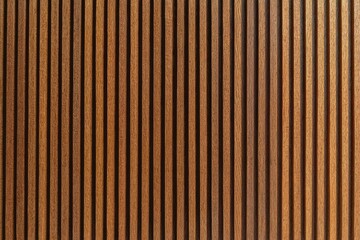 Obraz premium Close-up of vertical wooden slats forming a striped textured pattern.