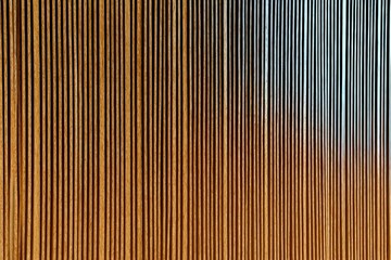 Obraz premium Vertical wooden and metal stripes create a modern, textured wall with a minimalist, linear pattern.