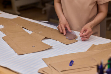 Tailoring Craftsmanship A Fashion Designer at Work Creating Beautiful Patterns with Precision