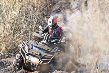 Off-road adventures. Quad bike rides through mud.