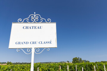 Typical vineyards with information board Grand Cru Classe near Saint-Emilion, Bordeaux, Aquitaine, France