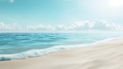 Obraz premium Clean sandy beach with a soft blue sky