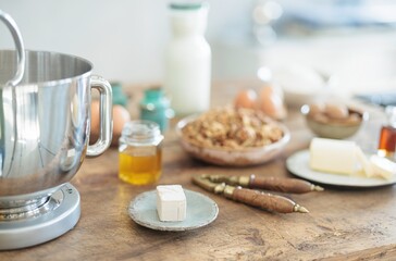 In a warm, rustic kitchen, a premium stand mixer helps prepare dough for Balkan Cozonac, a beloved sweet bread made with flour, eggs, and festive ingredients for holiday gatherings