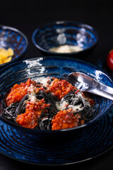 sepia spaghetti with minced mieat and tomato sauce