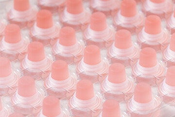 still life of pink glass  bottle stoppers