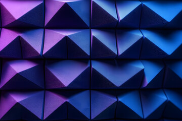 Textured acoustic foam panel in a pyramid pattern featuring blue and purple hues