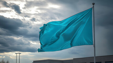 Turquoise Flag Waves Proudly Against Dynamic Sky, Conveying Hope and Change