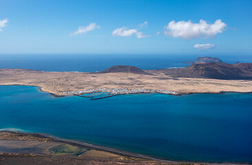 Landscape photography of island la Graciosa, Lanzarote, Spain, seascape, rocky coast, village, desert, volcano, tourism, tourist destination
