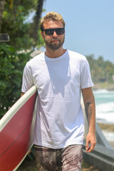 A Passionate Surfer Ready to Catch Exciting Waves in a Beautiful Tropical Paradise