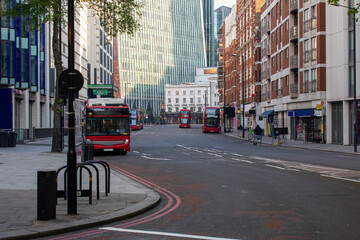 A peaceful and quiet urban street featuring buses in a modern and dynamic cityscape - Westminster - London
