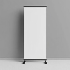 A blank, freestanding retractable banner stand with a black base and white display area
