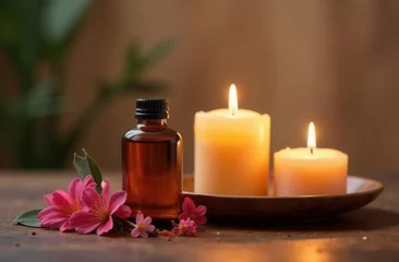 Aromatic ambiance with candles and essential oil bottle on wooden surface